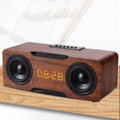 Enceinte Bluetooth en bois avec horloge et support carte TF / clé USB, haut-parleur de bureau design.