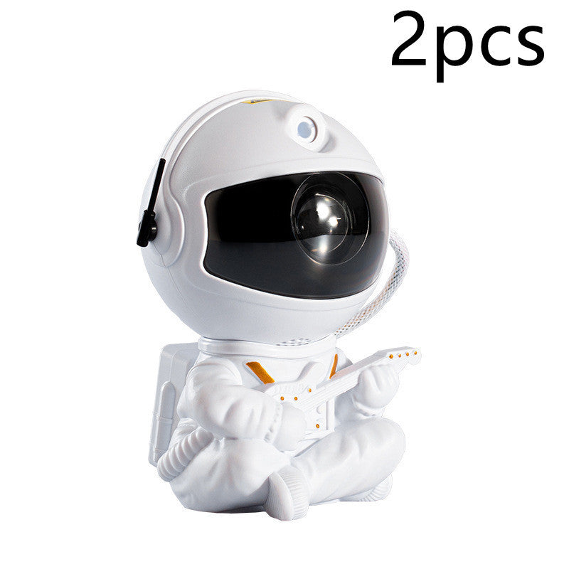 Lampe projecteur étoilée Mini  Astronaute – Veilleuse décorative créative avec projection colorée du ciel nocturne